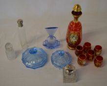 Glassware including a silver topped bott
