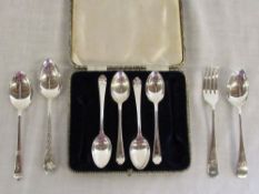 Cased set of silver golf teaspoons (4 on