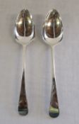 Pair of silver serving spoons London 180