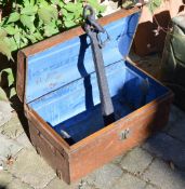 Old tin trunk and a ships anchor