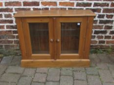 Pine glass fronted display cabinet