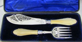 Cased set of ornate silver fish servers