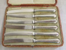 Cased set of silver handled butter knive