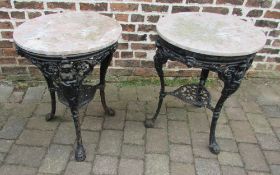 Pair of cast iron pub tables with marble
