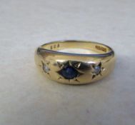 9ct gold ring with diamond and sapphire