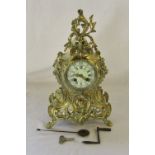 French brass mantle clock in the rococo