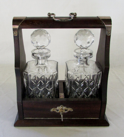 Tantalus with 2 glass decanters