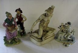 Pair of figurines, soldier figure signed