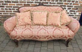 Victorian sofa with cushions on scroll f