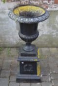 Cast iron urn on stand, height approx 10