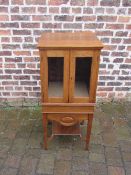 Oak cabinet on stand