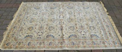 Cream ground Kashmir rug with an all ove