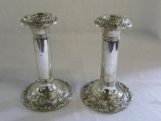 Pair of weighted silver candlesticks Bir