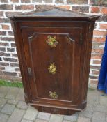 George III oak corner cupboard with flut