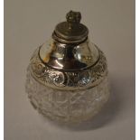 Silver topped scent bottle