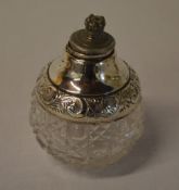 Silver topped scent bottle