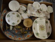 Various ceramics including plates, cups,