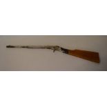 Tin plate toy rifle (possibly fires cork