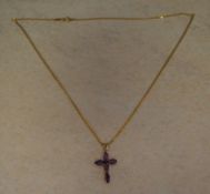 A 9ct gold and amethyst cross pendant, t