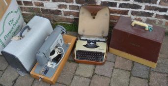 2 sewing machines and a typewriter