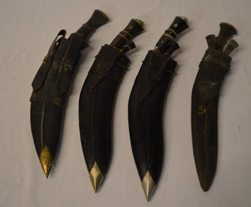 4 Kukri knives with sheathes and smaller