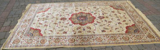 Gold ground Kashmir carpet with a bespok