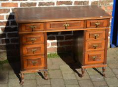 Small Victorian pedestal desk with brass