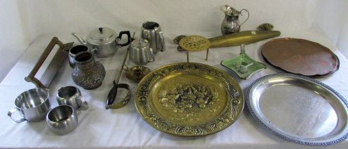 Suitcase containing various brass ware,