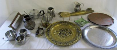 Suitcase containing various brass ware,