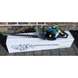 Petrol hedge trimmer in its box