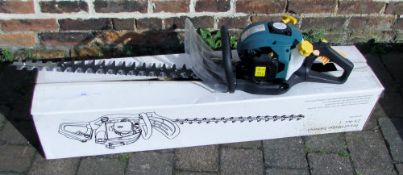 Petrol hedge trimmer in its box