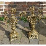 Pair of brass candelabra's in the rococo