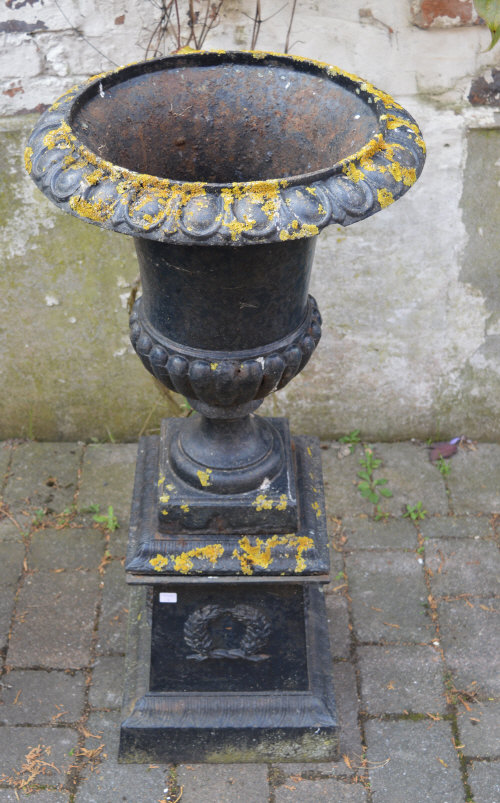 Cast iron urn on stand, height approx 10