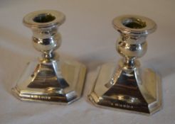 Pair of silver candlesticks (weighted)