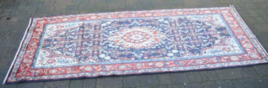 Blue ground Persian runner with an all o