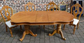 Ornate table and 4 chairs extending to 1