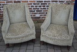 Pair of upholstered armchairs on turned