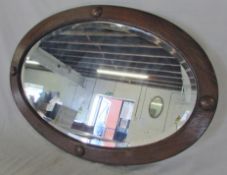 Oval mahogany mirror