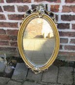 Oval gilt framed mirror