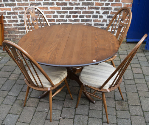 4 Ercol swan back chairs and a draw leaf