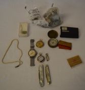 Various coins and costume jewellery