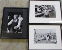 3 black and white framed photographs of