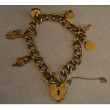 9ct gold charm bracelet with various 9ct