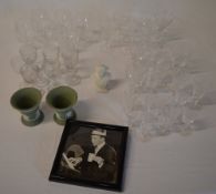 Various drinking glasses, a small bust,