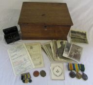 Wooden box containing WWI medals and min