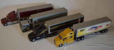 4 Franklin Mint semi trucks with trailer