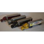 4 Franklin Mint semi trucks with trailer