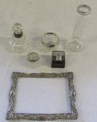 Assorted silver topped glass pots and pe