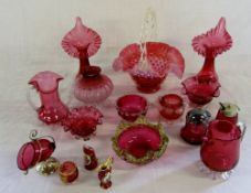 Assorted cranberry glass vases, bowls et