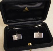 Tested as 18ct white gold cufflinks with